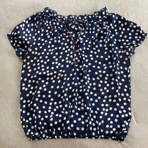 Blue/White polka dot blouse with orange lining at collar
